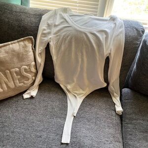 Woman’s long sleeve bodysuit